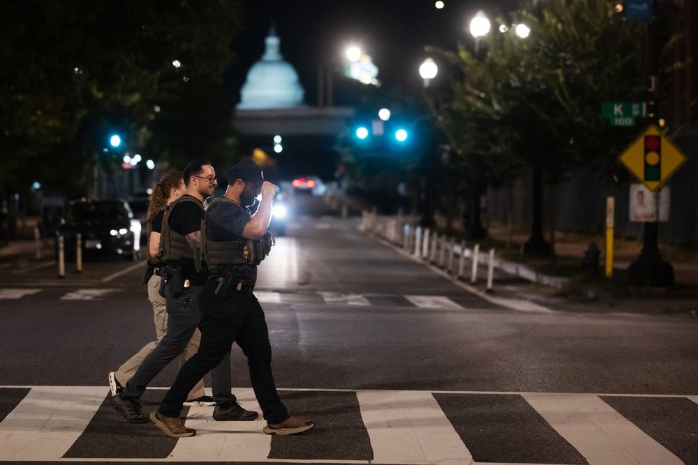 The on-the-ground impact of Trump’s federal actions came into view Tuesday night, with National Guard Humvees staged near the Washington Monument.