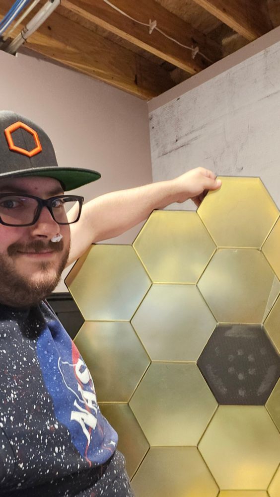 Nomad holding a JWST model