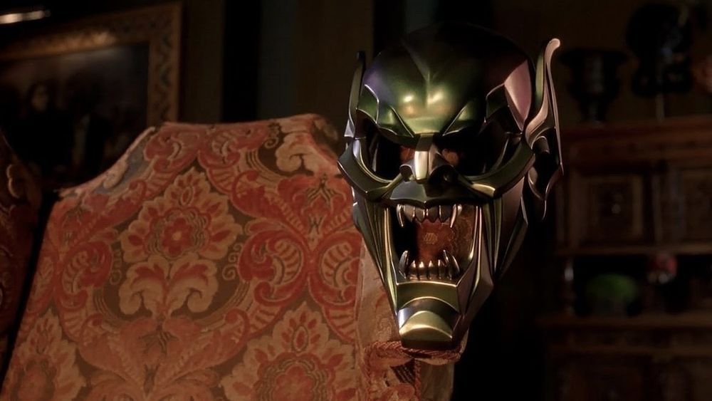 Goblin mask dangling from chair