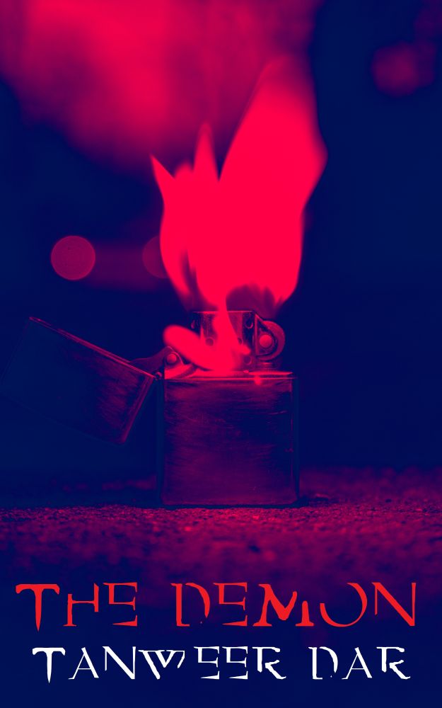 Front cover of my book, 'The Demon', featuring an open/ignited lighter on an asphalt surface. The cover is coloured in red, pink and blue.
