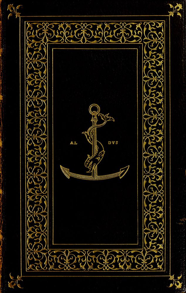 The front board of a handsomely bound book featuring a gold-tooled arabesque border and the device of Aldus Manutius tooled in gold in the centre