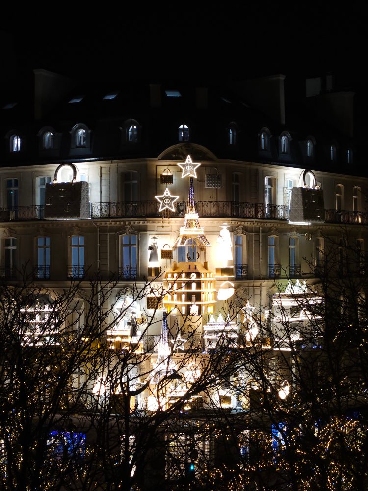 Christmas decorations for the Dior boutique and Avenue Montaigne, taken at night from a balcony opposite.