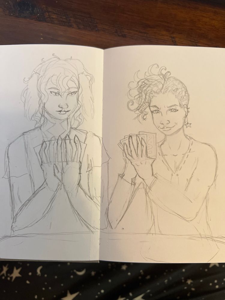 A half human half dog man, playing card with an androgynous looking person.