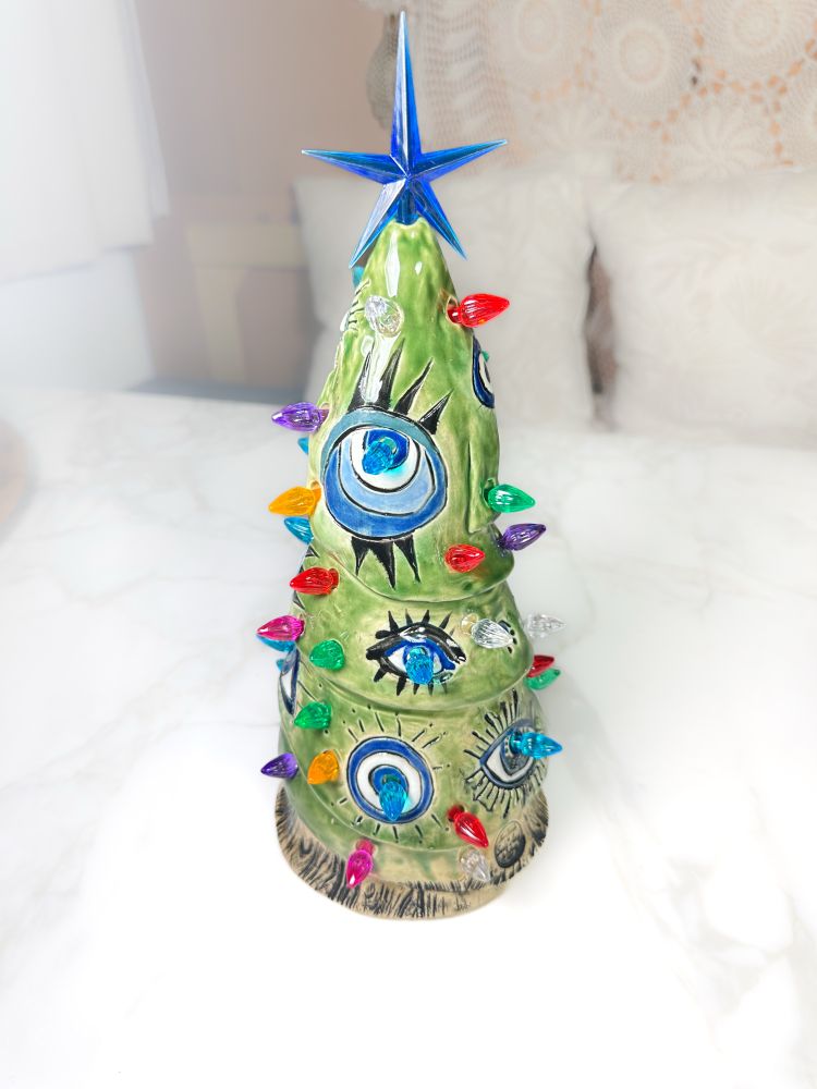 An evil eye light up Christmas tree. 