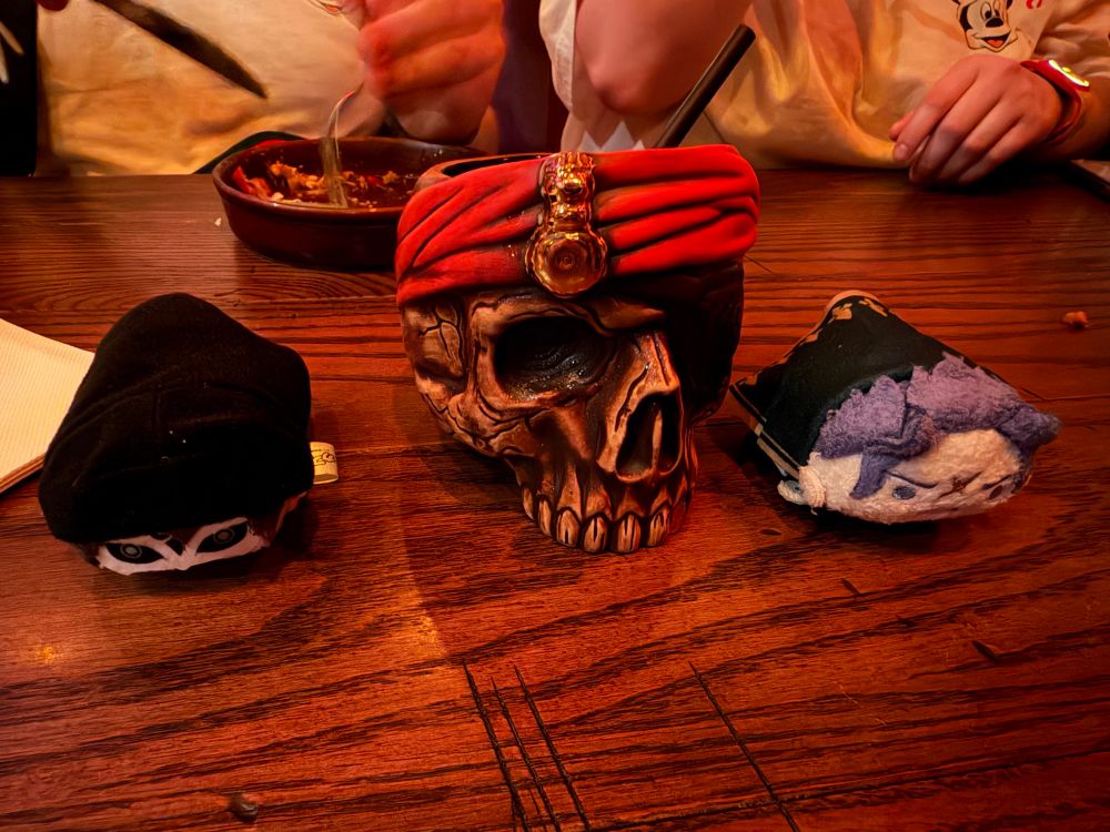 MD tsum and Barok tsum both next to a skull mug