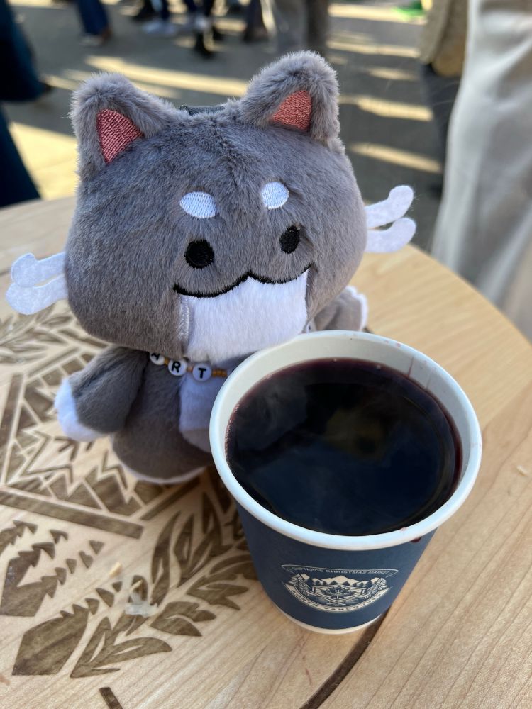 Noribubu stealing a sip of mulled wine