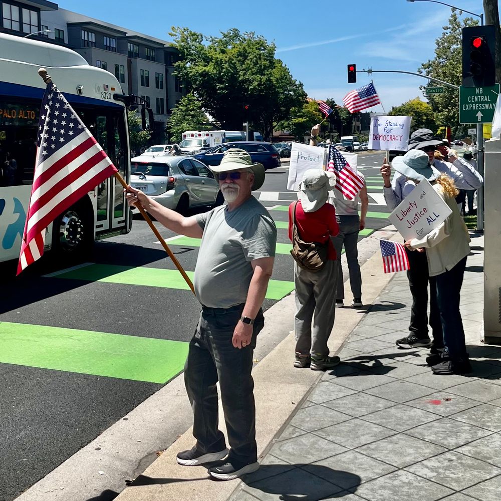 Group of protesters with American flags. 