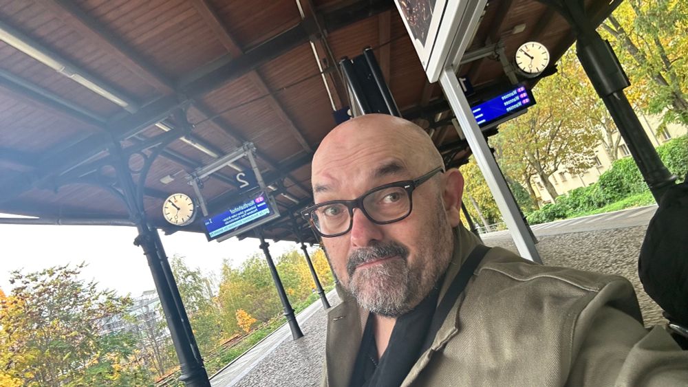 Bespectacled beardy northern homo wearing HebTroCo in Berlin. 
