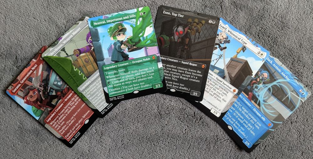 photo of 6 custom printed full art mtg cards spread out. 