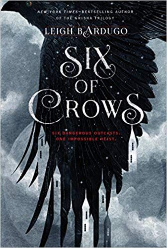 Book cover. Six of Crows by Leigh Bardugo (Six of Crows duology / 2015) Cover shows a crows wing above a city.