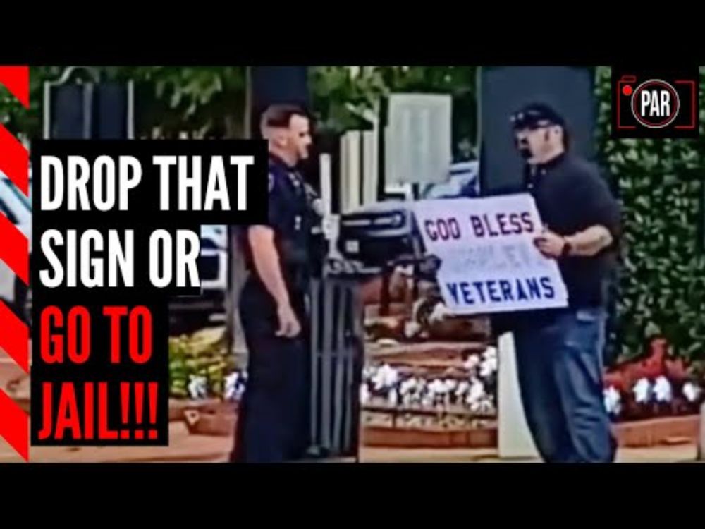 They told him his sign was illegal. What happened next shows cops don't know the law.