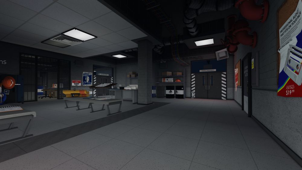 A grey maintenance area with various benches, doors leading to other areas, pipes & wiring on the ceiling, and a few posters.