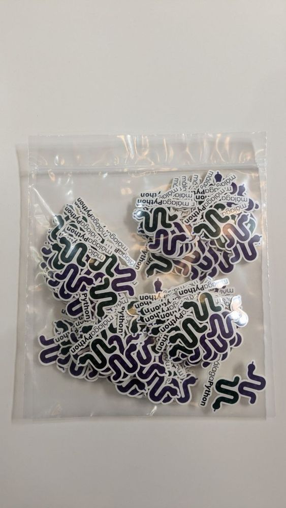 Bolsa con pegatinas de Python Málaga