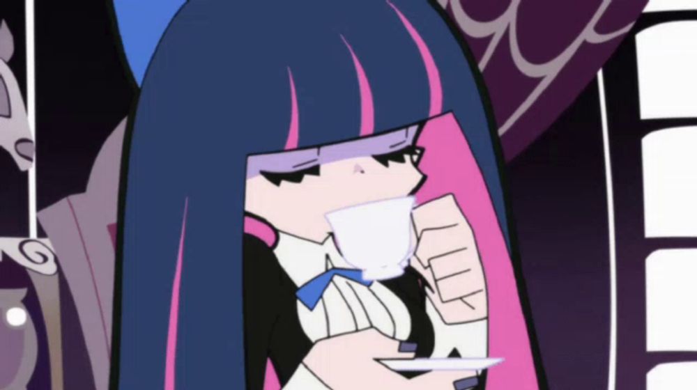 a cartoon character with long black hair drinking a cup of tea