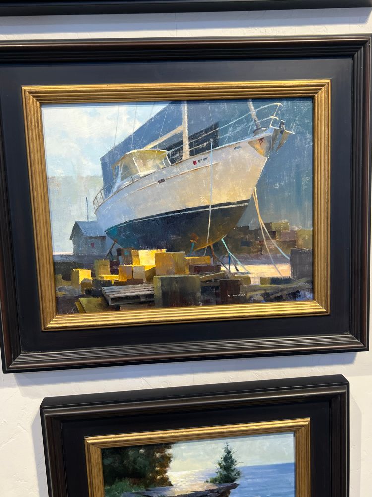 Winning painting by Marc Anderson of ship raised on land in front of building with boxes surrounding 