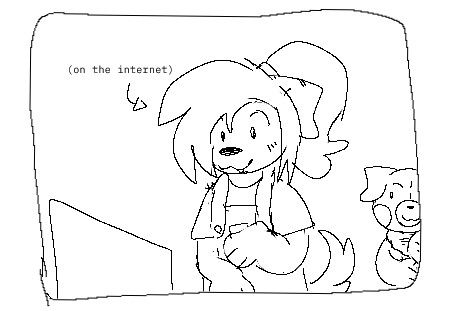 maggie on her computer as patches peeks out from behind a corner