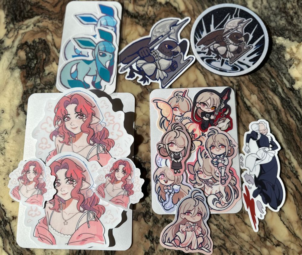 picture of various adorable stickers and a coaster made by @sakokii !!!! 