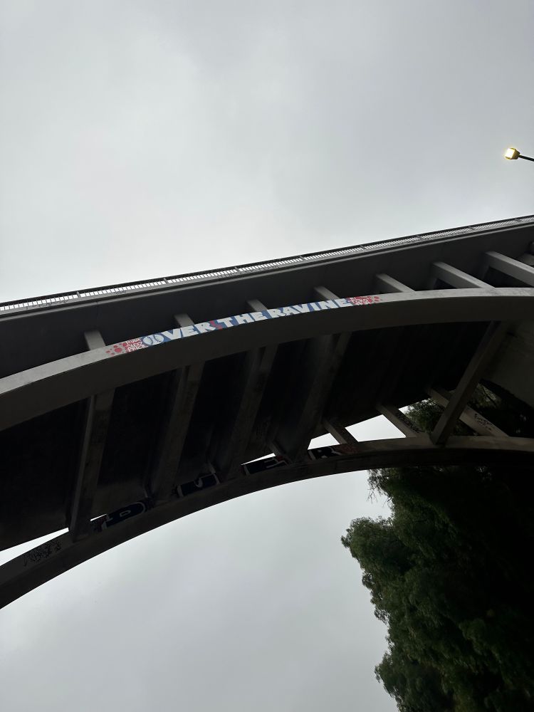 The 110 Overpass over Chavez Ravine tagged with “OVER THE RAVINE” with “El ‘Toro’ #34” on the right side. 