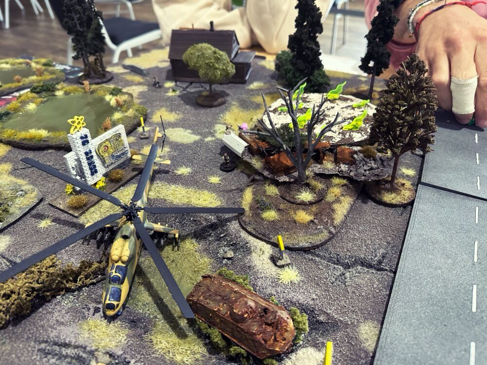 Crashed helicopter terrain and scatter with Soviet city sign. 