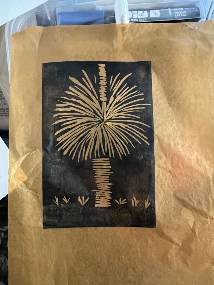 A white image on a black background of a grass tree