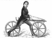 close up crop of an illustration from the previous post. a man in long coattails with a sassy black haircut stands astride a bicycle of sorts with his legs splayed wide. the bicycle consists of two equal-sized wheels with a confusing frame between them that has no pedals or handlebars, just a long straight bit over the front wheel. it almost looks like he's sitting on it backwards. but he knows what he's doing, he's got an air of confidence 