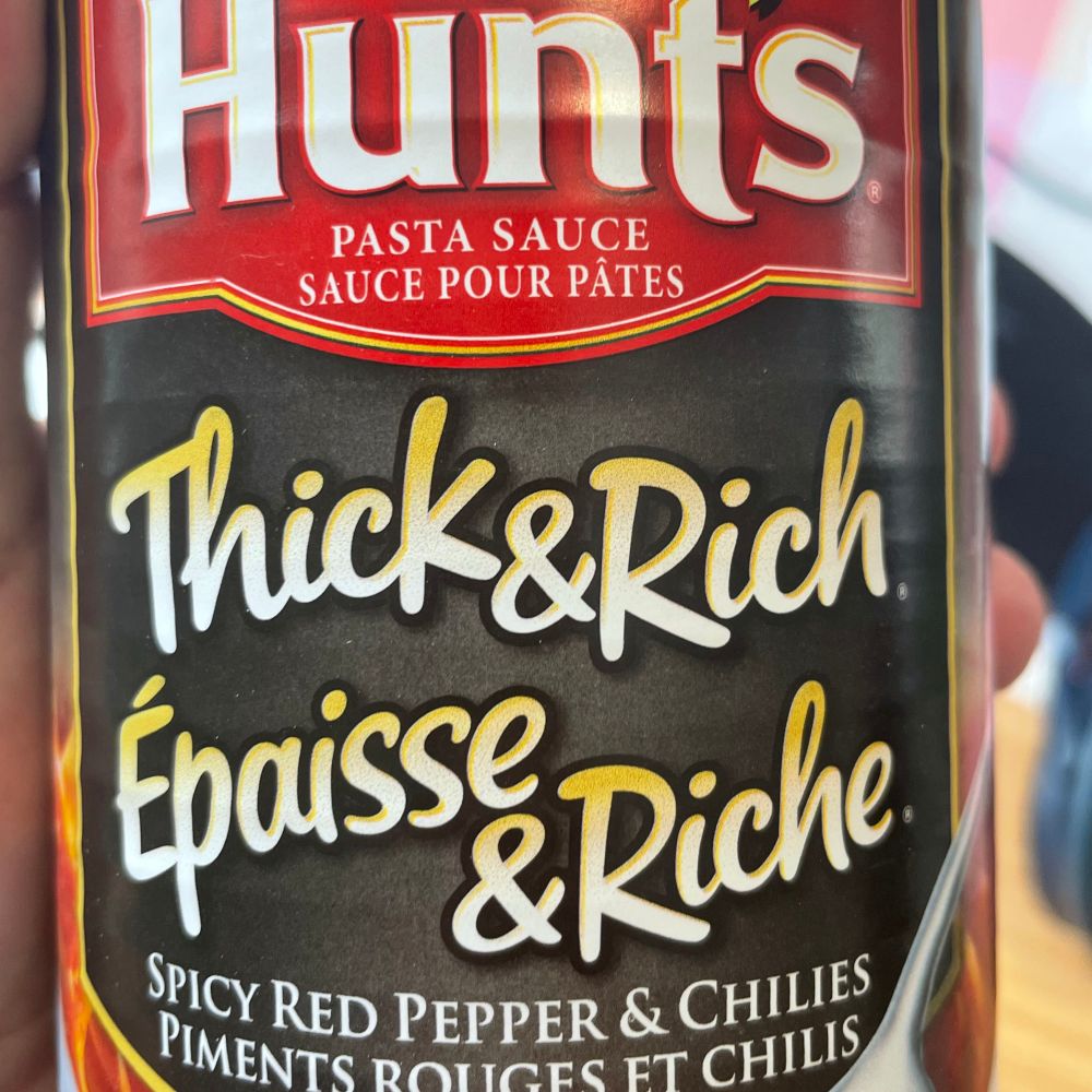 A can of Hunt’s “Thick & Rich” pasta sauce 