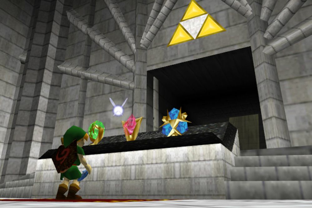 image du jeu zelda ocarina of time : Link devant le joyau kokiri, le rubis goron et le saphir zora