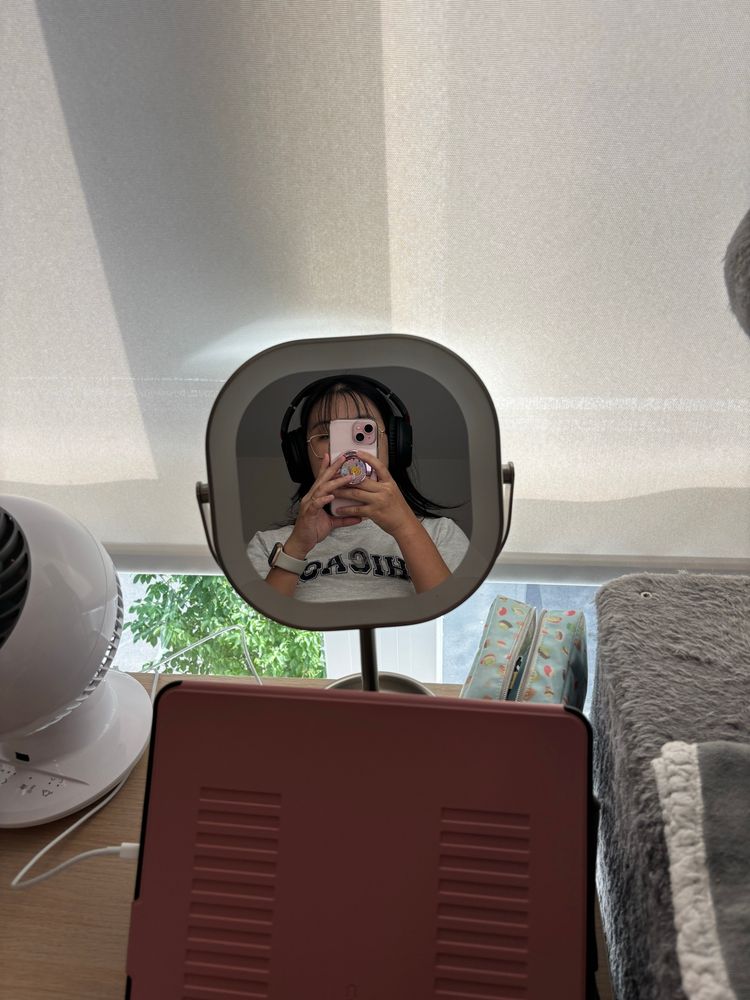 A photo of me in my small mirror
