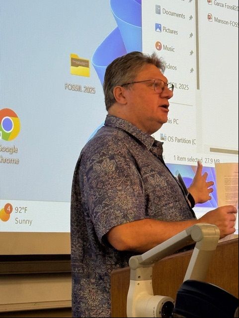 Person speaking at a podium