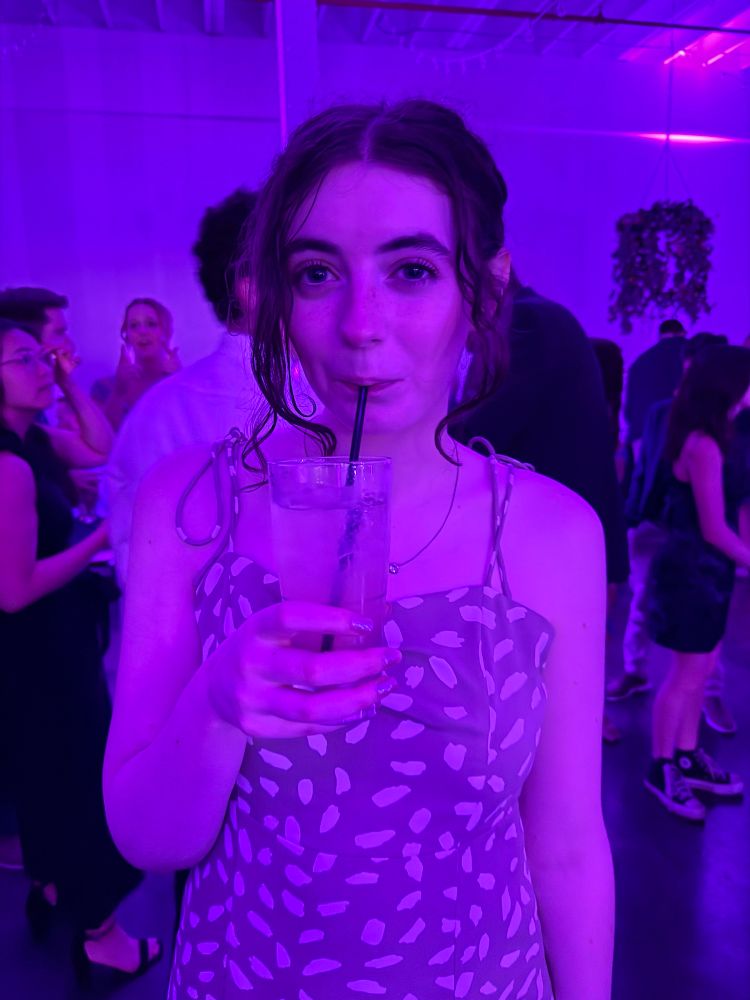 Maddie sipping and tearing it up on the dance floor