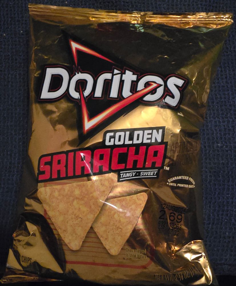 a small bag of the new Doritos Golden Sriracha chipa