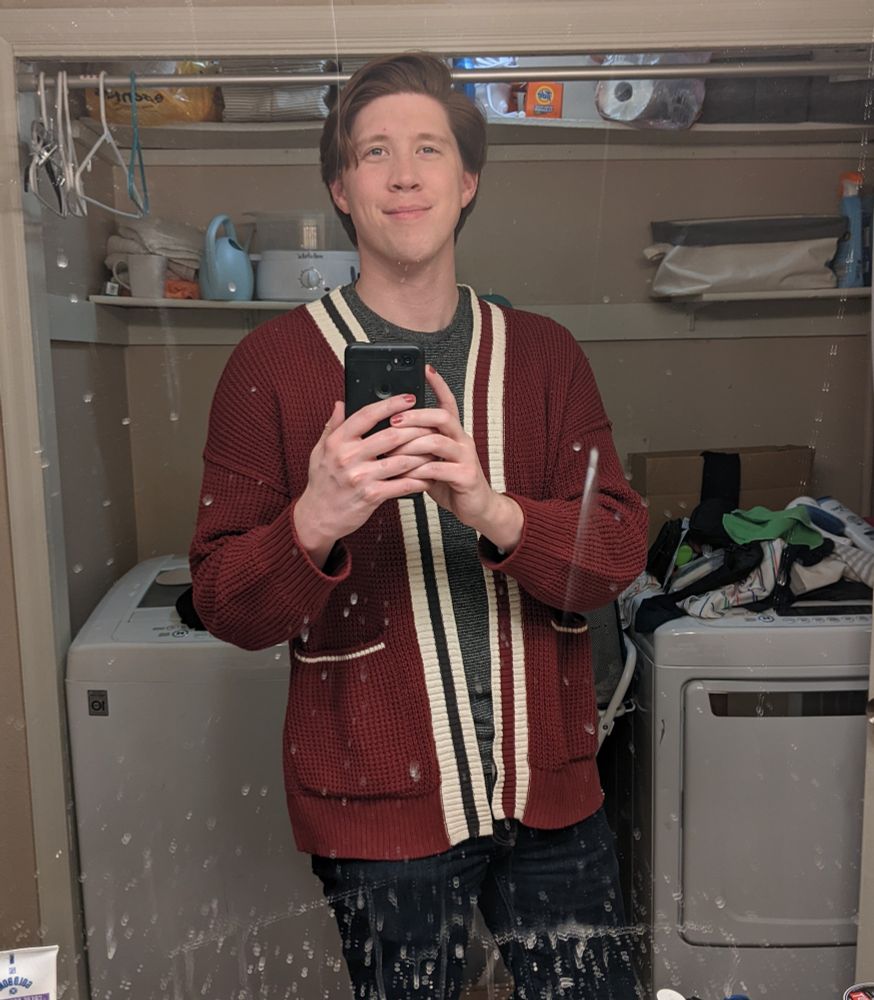 Morgan wearing a red cardigan, day one of HRT