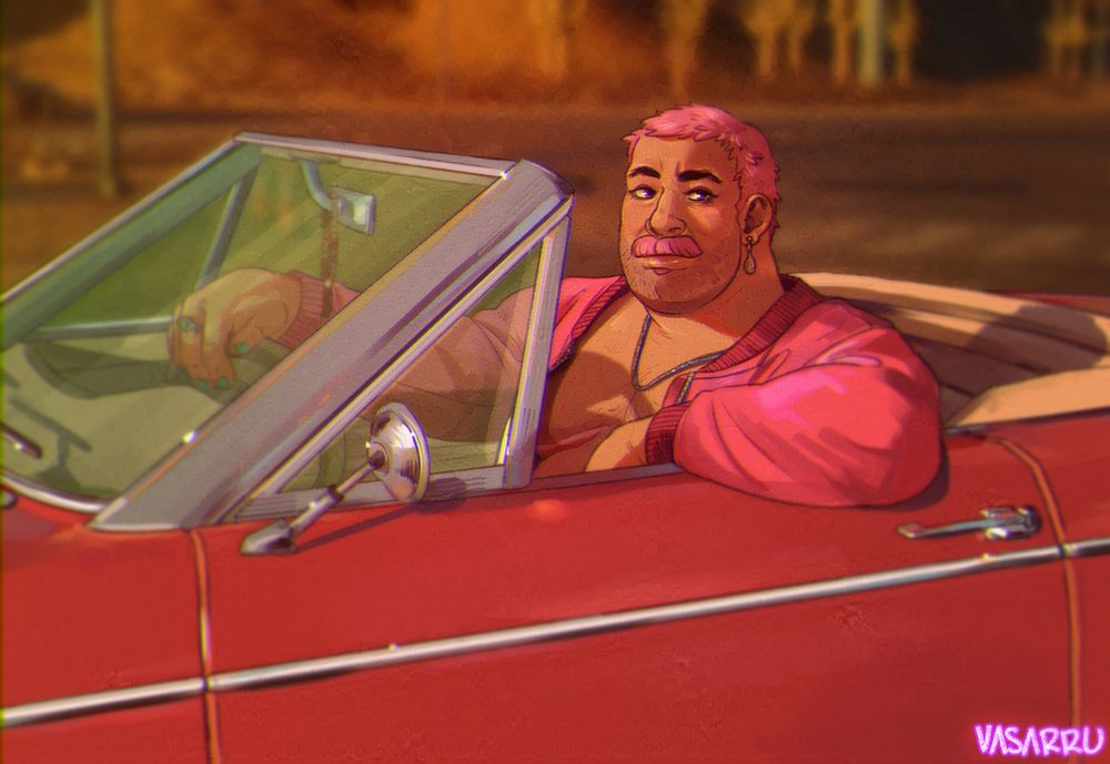 A man sitting in a red cabriolet.
He has short pink hair and a pink mustache. 
Wearing a pink jacket, no shirt underneath, silver necklace and a dangly earring.
He's got one hand resting on the steering wheel and one arm resting on the door. He's looking towards the viewer.