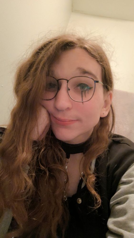 Zoey just kinda drunk smiling at you, got the crazy eyeliner 