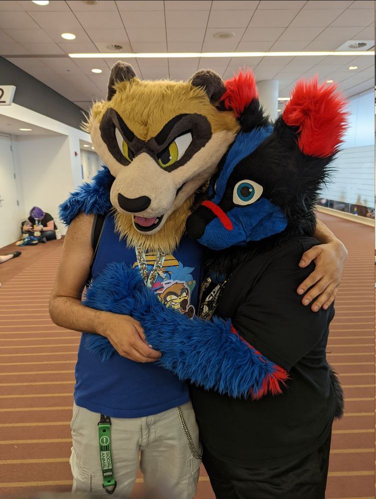 Bryan and Skylar sharing a hug at AC