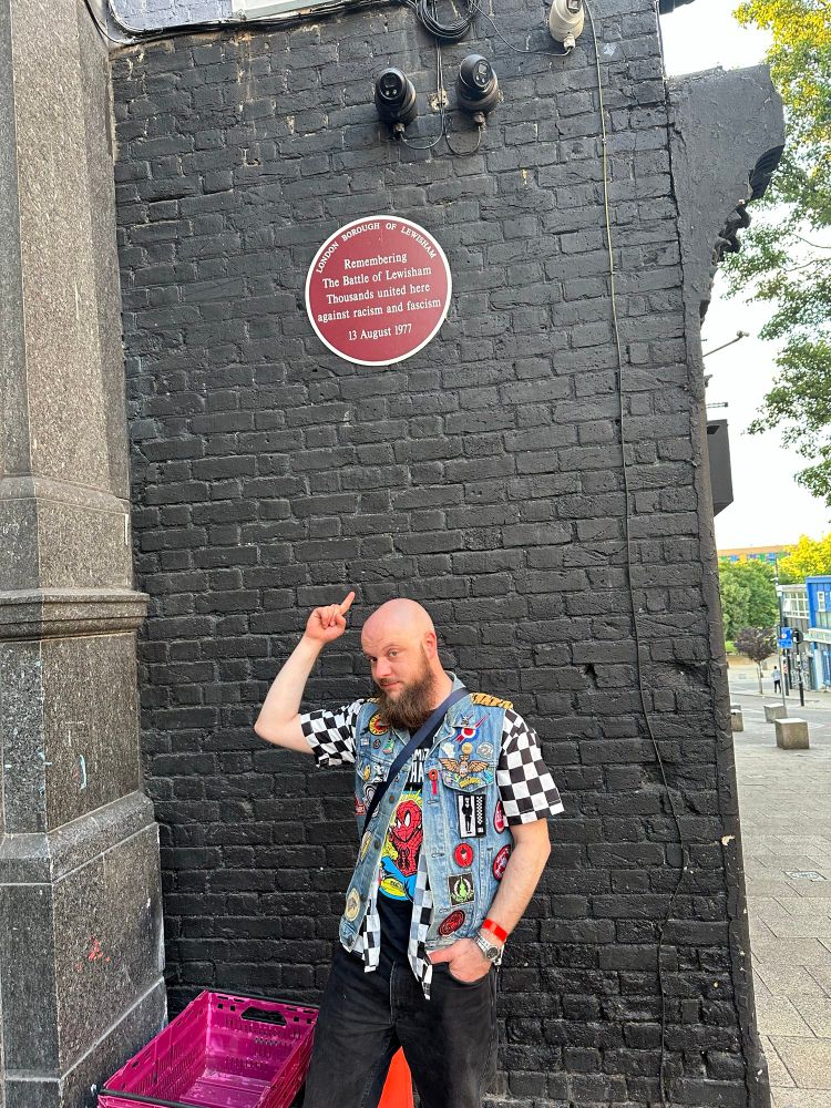 Me in front of a commemorative plaque.

“Remembering the Battle of Lewisham 
Thousands united here against racism and fascism”
13 August 1977