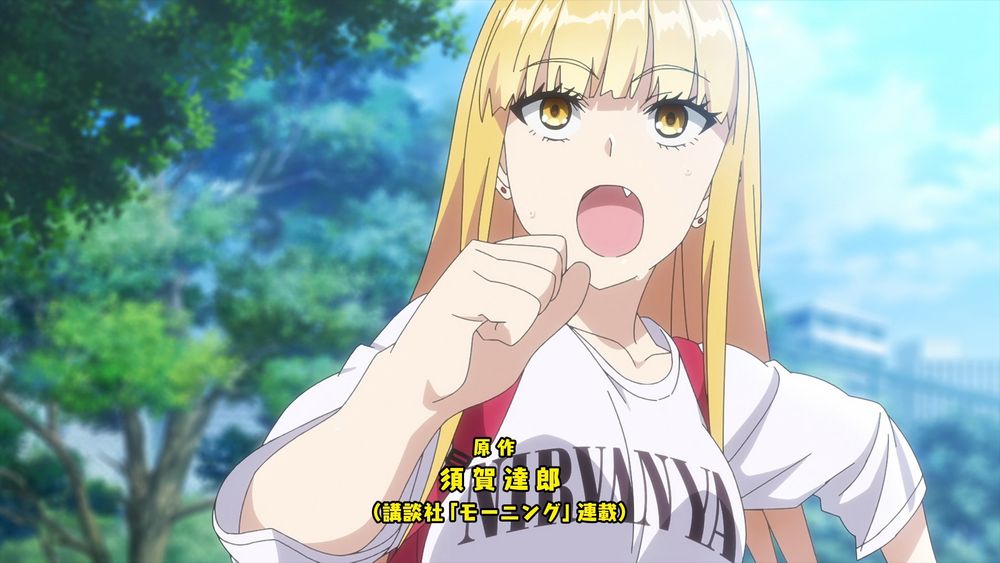 Ruriko from the opening running to work wearing shirt designed after an old Nirvana shirt but spelled "Nirvanya"

Also, DAT FANG!