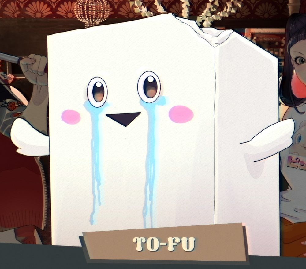 To-Fu, the crying tofu mascot, smiling and blushing with happiness