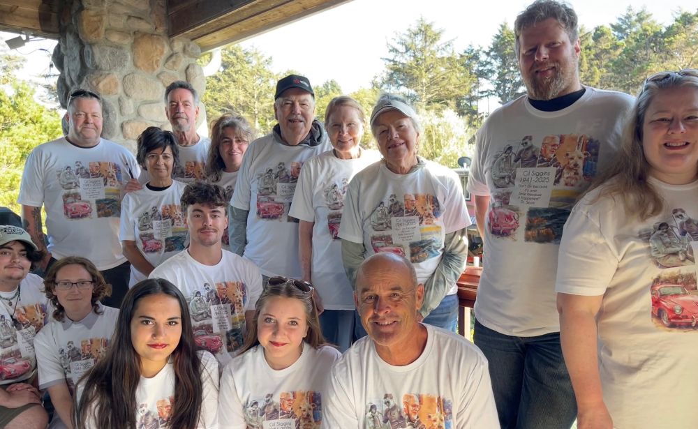 a group photo depicting a large white family, all wearing the same graphic t shirt