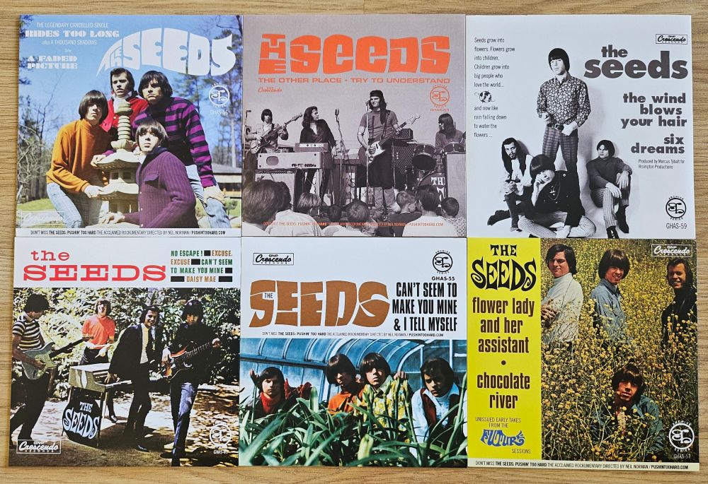 Top Row. Left to Right.
•"A Thousand Shadows" (aka "Rides Too Long") b/w "A Faded Picture"
•"The Other Place" b/w "Try To Understand"
•"The Wind Blows Your Hair" b/w "Six Dreams"

Bottom Row. Left to Right.
•"No Escape"-"Excuse, Excuse" b/ w "Can't Seem To Make You Mine"-"Daisy Mae"
•"Can't Seem To Make You Mine" b/w "I Tell Myself"
•"Flower Lady & Her Assistant" b/w "Chocolate River"
