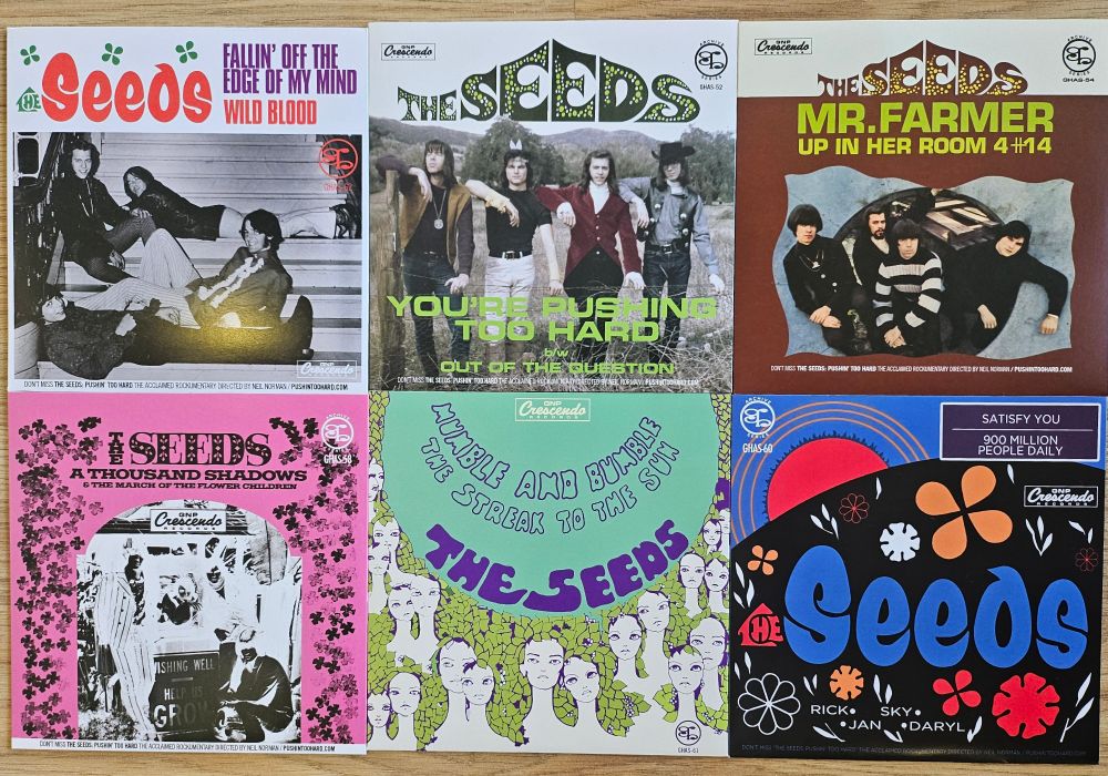 Top Row. Left to Right.
•Fallin' Off The Edge Of My Mind" b/w "Wild Blood"
•"You're Pushing Too Hard" b/w "Out Of The Question"
•"Mr. Farmer" b/w "Up In Her Room"

Bottom Row. Left to Right.
•"A Thousand Shadows" b/w "March Of The Flower Childrem"
•"Mumble Bumble" b/w ""The Streak To The Sun"
•"Satisfy You" b/w "900 Million People Daily (All Making Love)"