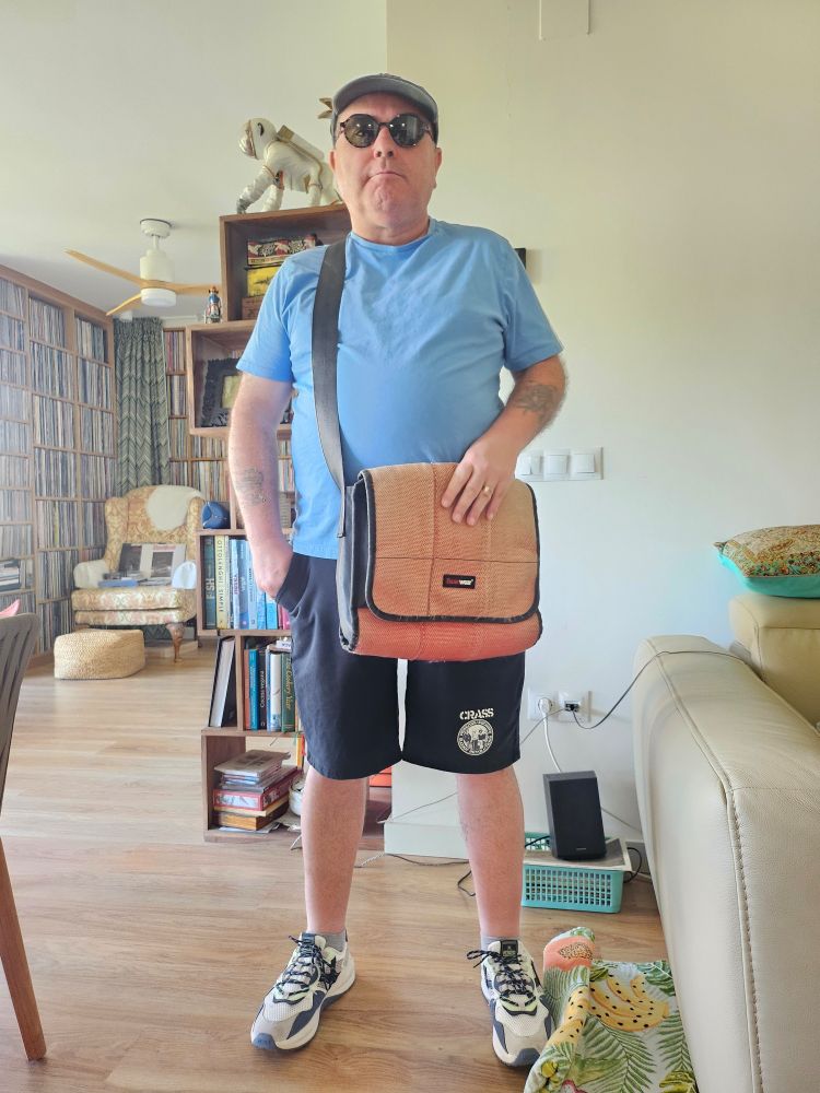 Happy boy about to go record shopping.
