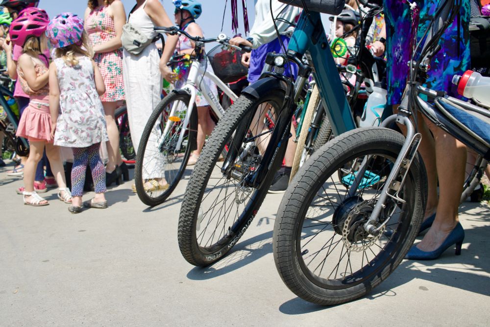 Bike wheels and a high heel shoe