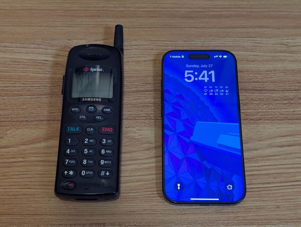 A 1999 era Sprint/samsung phone with a pop up antenna and an Apple iPhone 16 pro showing a spaceship earth background 
