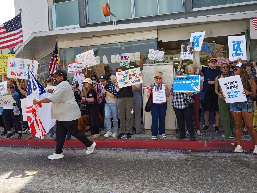 Culver City protestors lining up on curb.