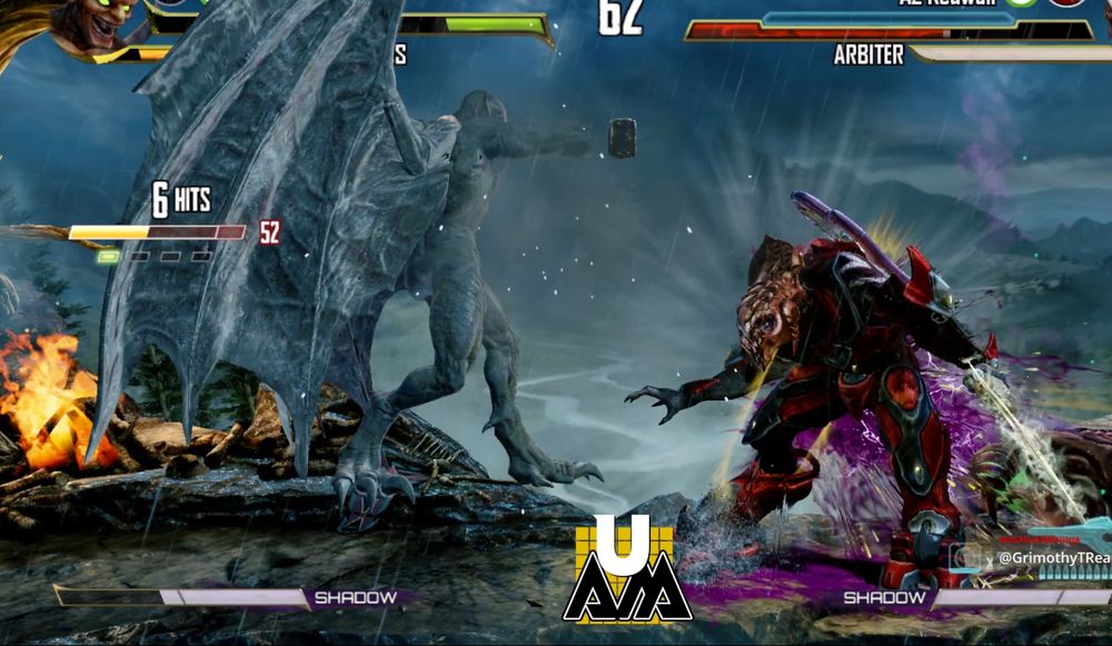 A screenshot of Killer Instinct (2013). Arbiter is being hit by Gargos in his stoneskin form while Gargos is doing a standing portal punch animation while floating in midair.