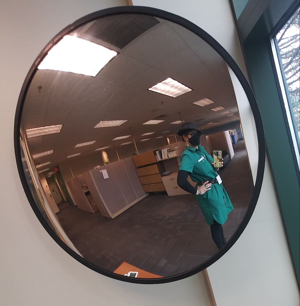 Reflection in a convex mirror and I'm wearing the fishie earrings