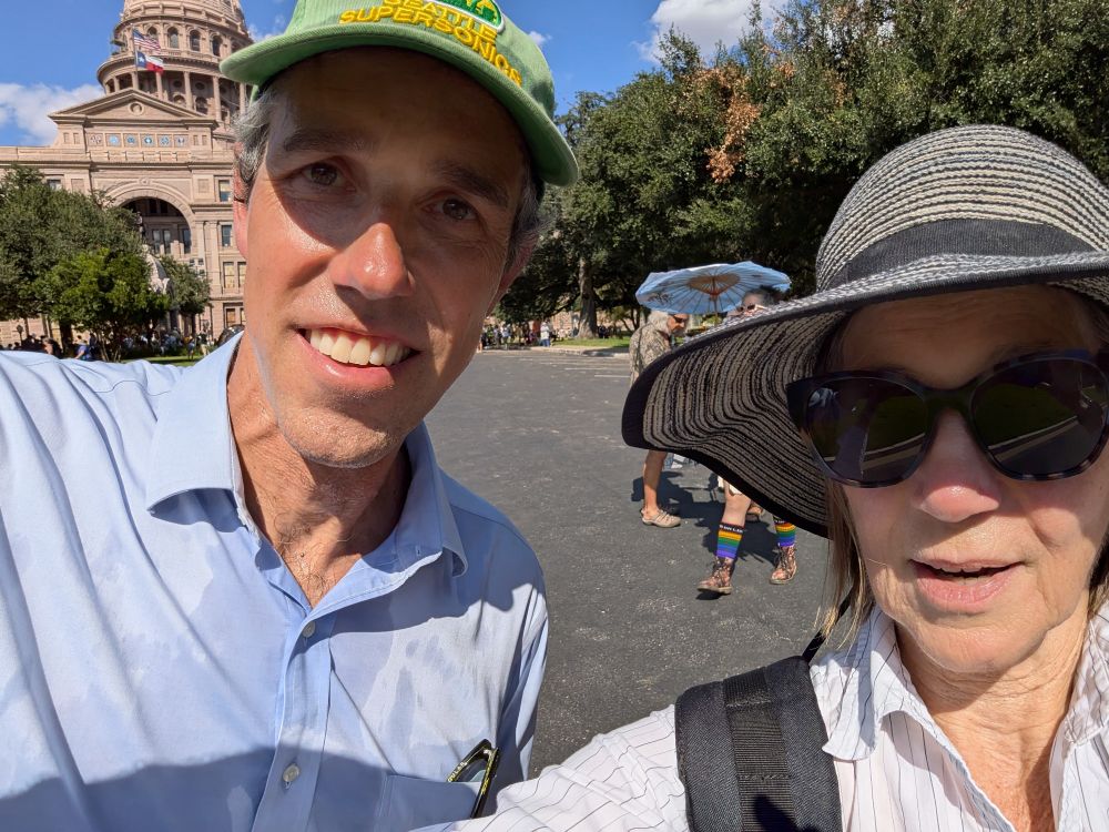Photo of Beto and a protester