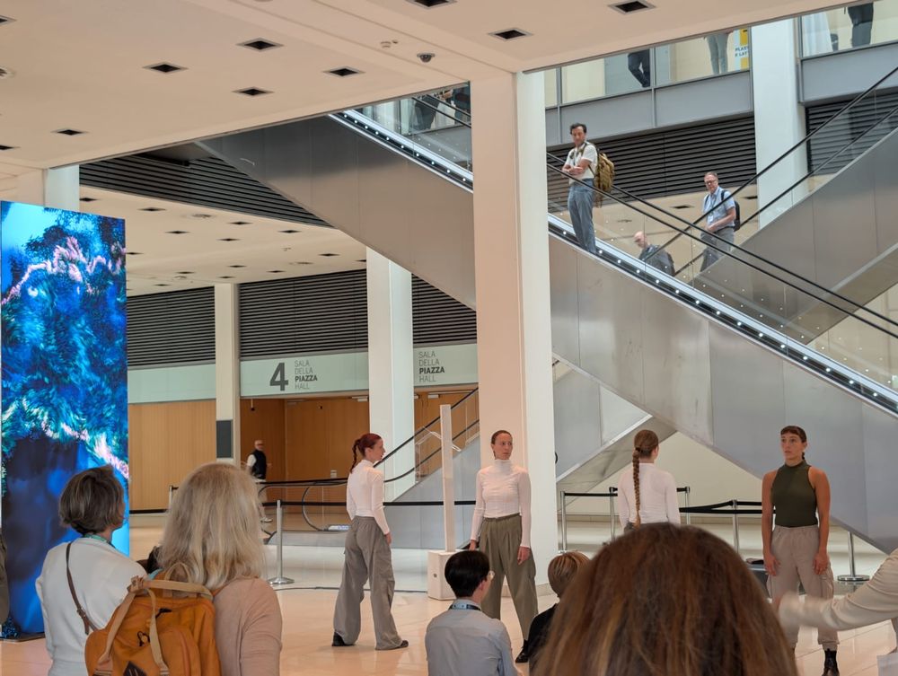 People gathering in the lobby of a building for the ECCA Conference