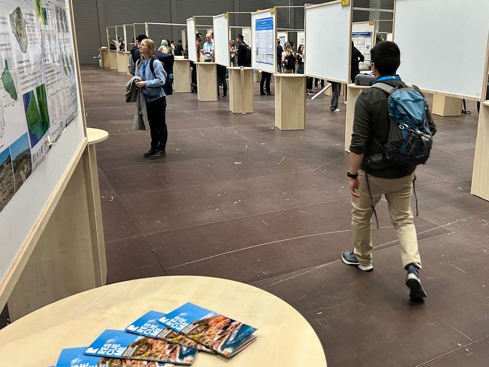 Poster session at EGU 2025 in Vienna, with RescueME brochures in the foreground
